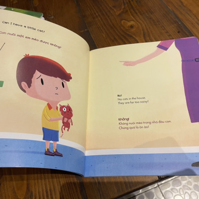 (Sách song ngữ Anh – Việt) CON NUÔI MỘT EM MÈO ĐƯỢC KHÔNG? - CAN I HAVE A LITTLE CAT? – Céline Claire , Sébastien Chebret - Bảo Bình dịch - Nhã Nam – bìa mềm minh họa in màu