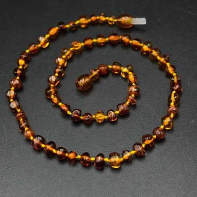 Vòng Cổ , Dây Chuyền Dành Cho Bé Hổ Phách Nhựa Thông Màu Đậm Chính Hãng BẠC HIỂU MINH DTE058S