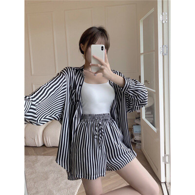 Áo sơ mi kẻ thời trang dáng dài rộng phong cách Hàn Quốc