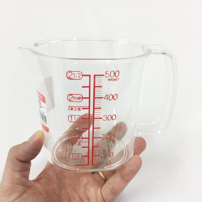 Combo dụng cụ nạo vỏ rau củ lưỡi xoay inox + ca đong có vạch chia 500ml - made in Japan