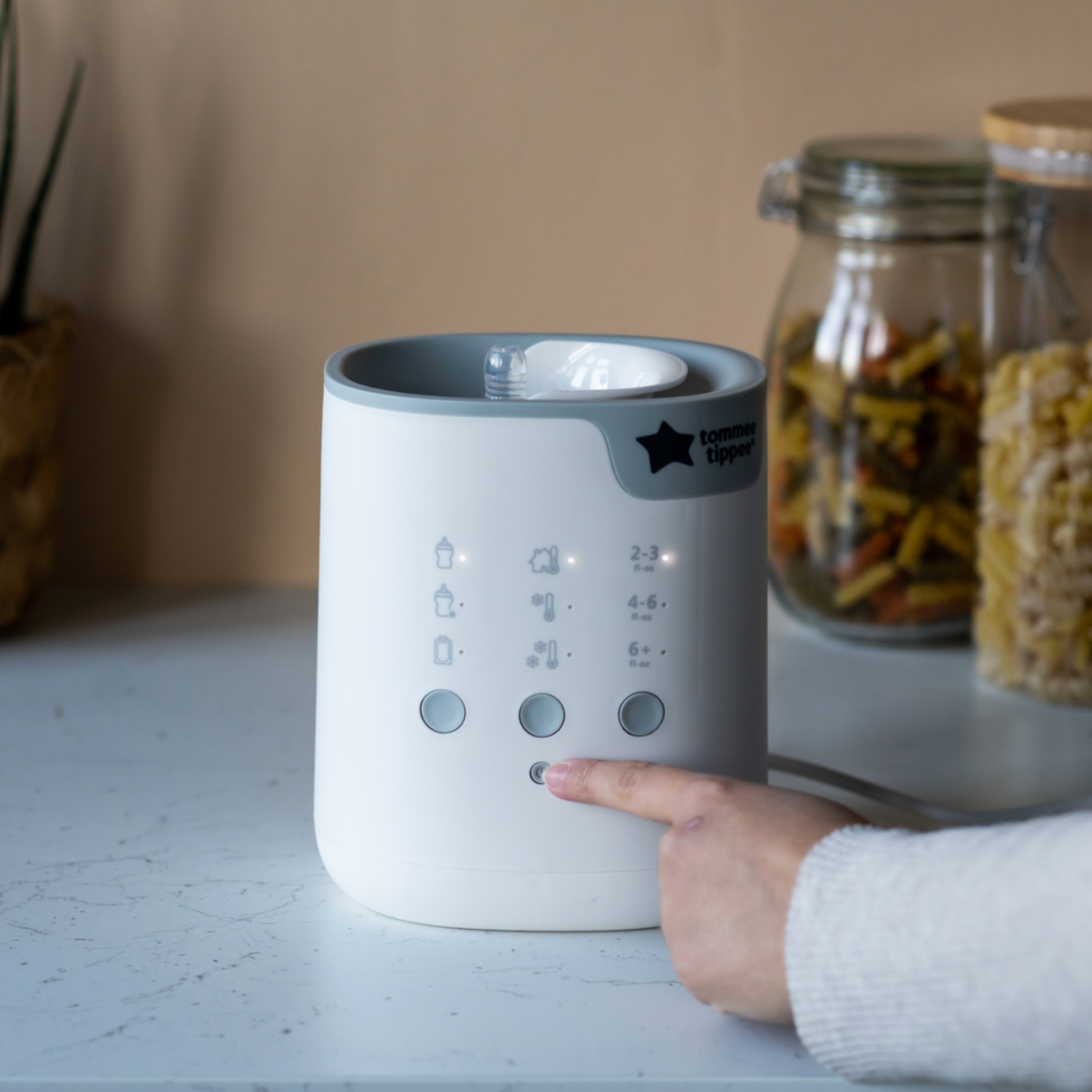 Máy rã đông, hâm nóng bình sữa và túi trữ sữa Tommee Tippee All-in-One