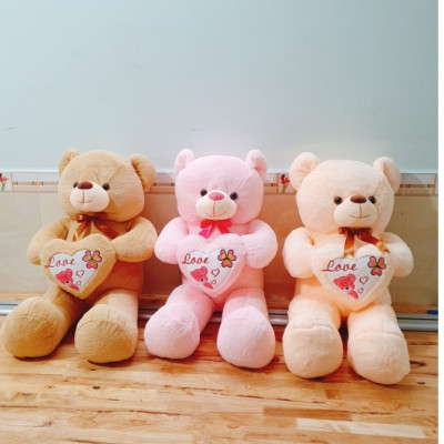 Gấu bông Teddy ôm tim - Size từ 1m1 đến 1m5 - Quà tặng gấu bông teddy vải lông tuyết mịn.