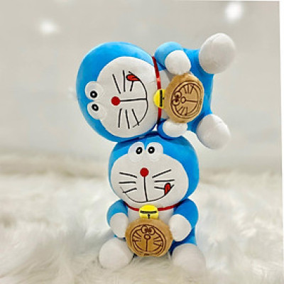 Thú nhồi bông Doraemon ôm bánh rán - Size từ 40cm đến 80cm - Quà tặng gấu bông Doraemon dễ thương.