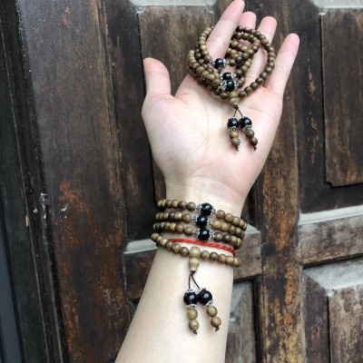 Vòng Tay Trầm Hương phối đá Tóc Đen cùng charm bạc thái - bình an, may mắn, tài lộc