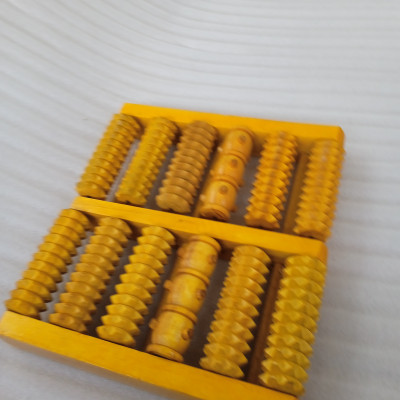 Bàn massage chân bằng gỗ N H home hai hàng lăn